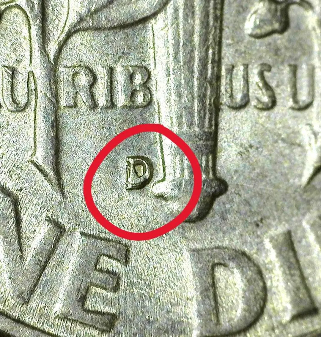 1950-D RPM dime close-up showing doubled D mintmark with ghost impression visible